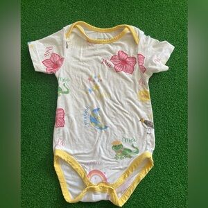 Coco moon onesie in Pot O’ Aloha print